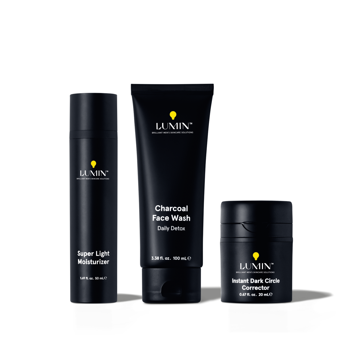Lumin men's skincare set with Super Light Moisturizer, Charcoal Face Wash Daily Detox, and Instant Dark Circle Corrector.
