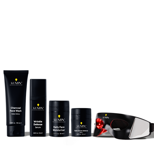 Lumin men's skincare set with charcoal face wash, wrinkle defense serum, daily moisturizer, dark circle balm, and LED eye mask.