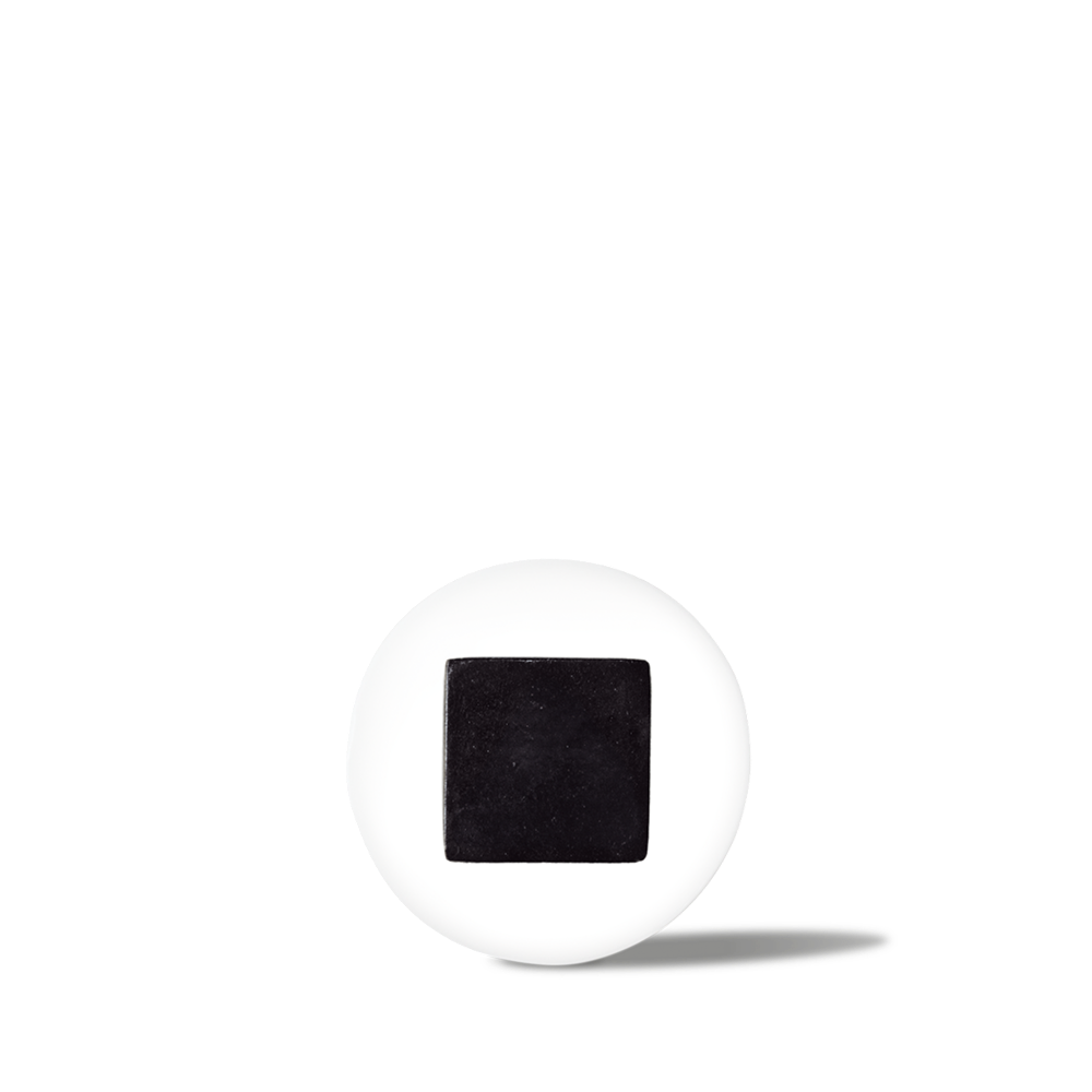 White pill with a black square imprint, medicine tablet for prescription or over-the-counter use.