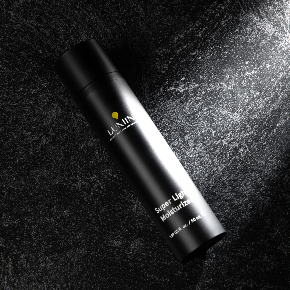 LUMIN Super Light Moisturizer black bottle on textured dark surface, men's skincare hydrating lotion 50 ml
